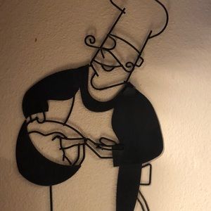Black metal chef for kitchen